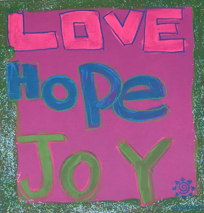 A painting of the words love, hope and joy