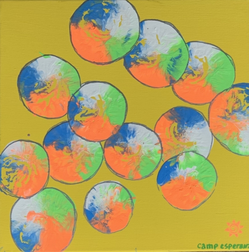 A painting of colorful earth 's in the shape of circles.